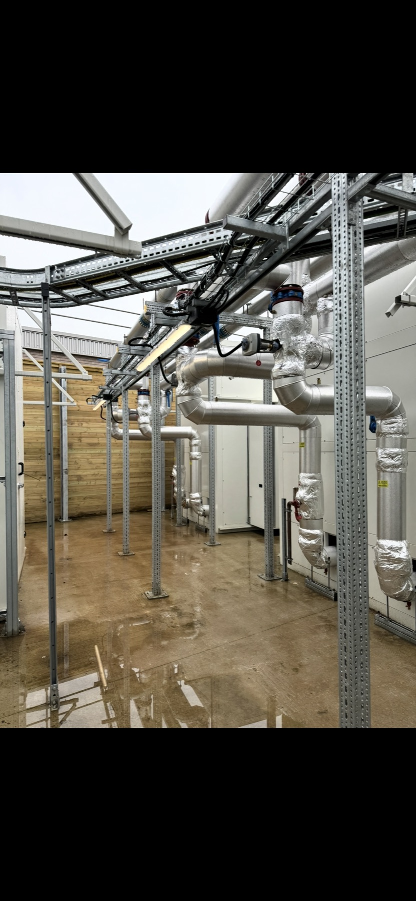 Cable containment and lighting alongside external plant equipment